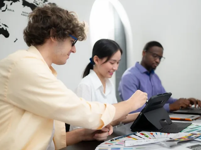A team tagging and sorting documents on tablets